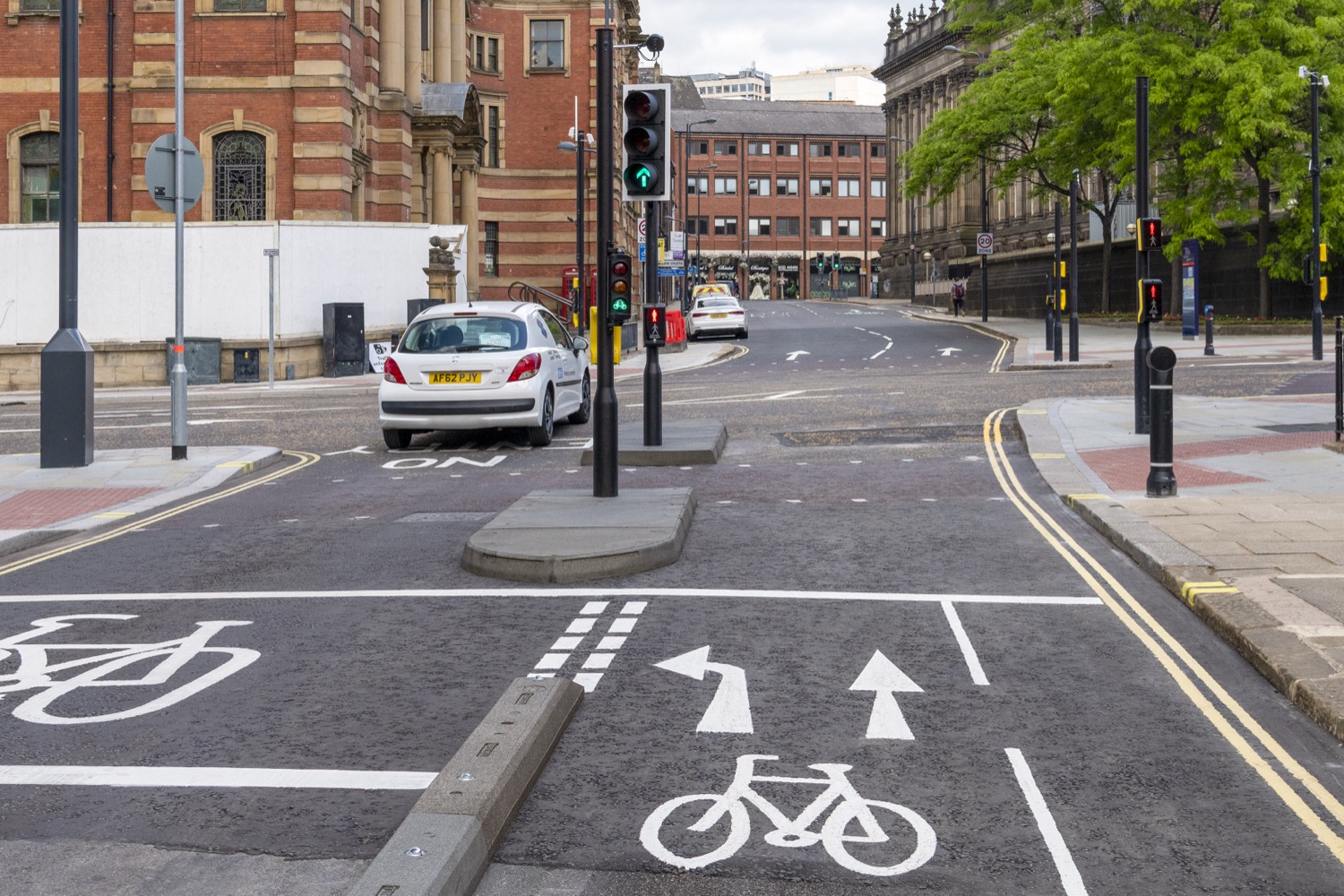 Rosehill traffic island integrated with pedestrian crossing infrastructure